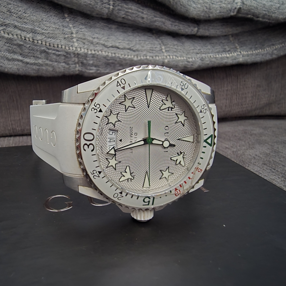 White and Green Star-Patterned Watch